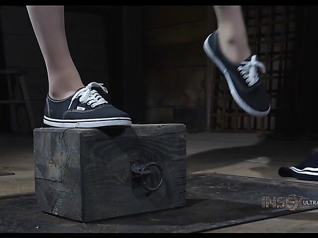 Pale skin girl Brooke Johnson in metal bondage