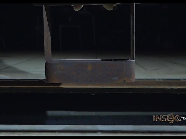 Pale skin girl Brooke Johnson in metal bondage