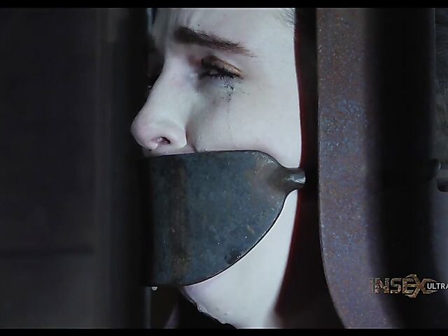 Metal device bondage and slave blowjob with Brooke Johnson