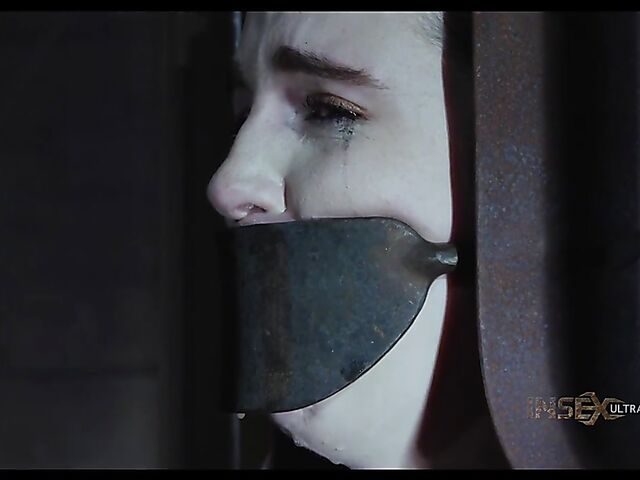 Metal device bondage and slave blowjob with Brooke Johnson