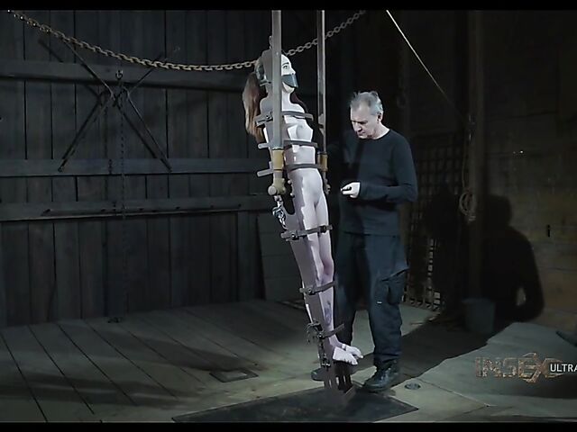 Metal device bondage and slave blowjob with Brooke Johnson