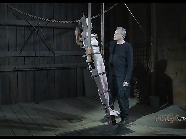 Metal device bondage and slave blowjob with Brooke Johnson