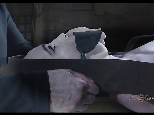 Metal device bondage and slave blowjob with Brooke Johnson