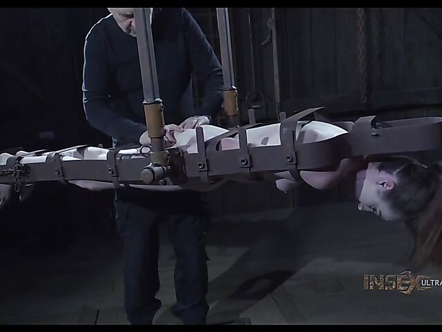 Metal device bondage and slave blowjob with Brooke Johnson