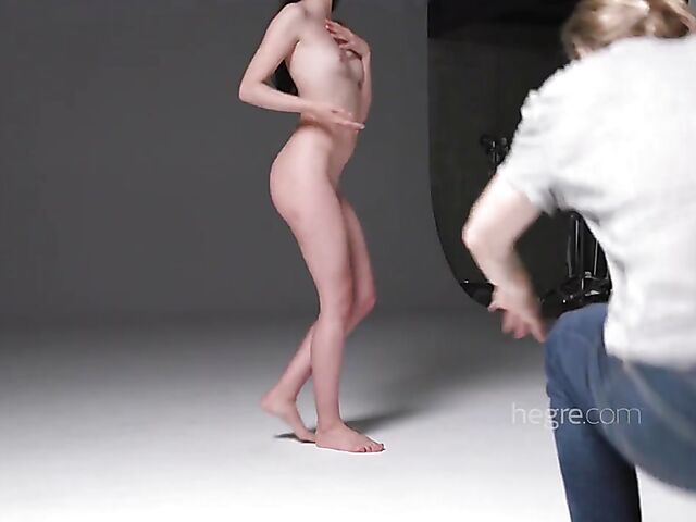 Young brunette model Alba shaving pussy in the shower for a nude photoshoot