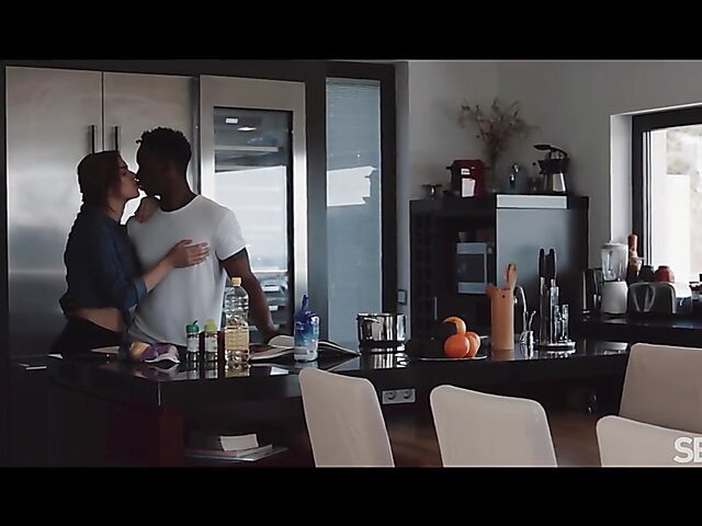 Sensual interracial couple Emily Mayers and Jesus Reyes do it in the kitchen