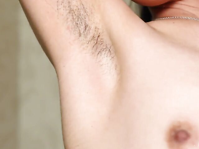Exotic flat-chested beauty Rezza love showing her hairy armpits and hairy pussy