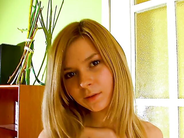 Sexy teen babe Paloma B takes off her panties and spreads her legs in the doorway