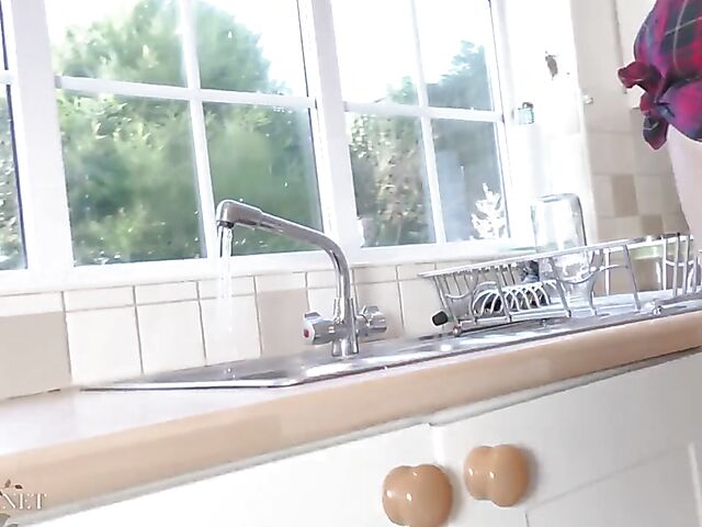 Katie L - Tight jeans and nice tits in the kitchen