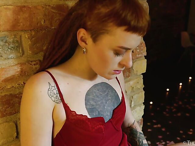 Tattooed redhead Bryla loves her black inflatable dildo