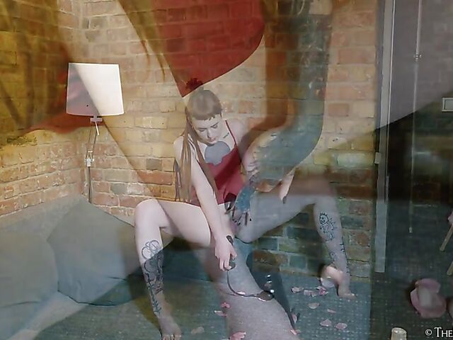 Tattooed redhead Bryla loves her black inflatable dildo