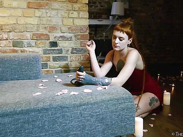 Tattooed redhead Bryla loves her black inflatable dildo