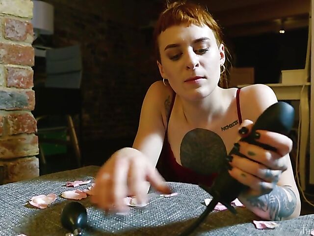 Tattooed redhead Bryla loves her black inflatable dildo