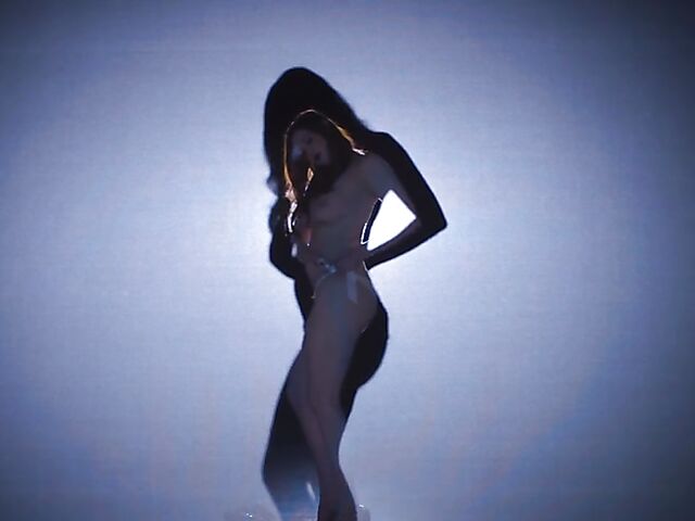 Sexy redhead Maitland Ward does a strip tease on stage