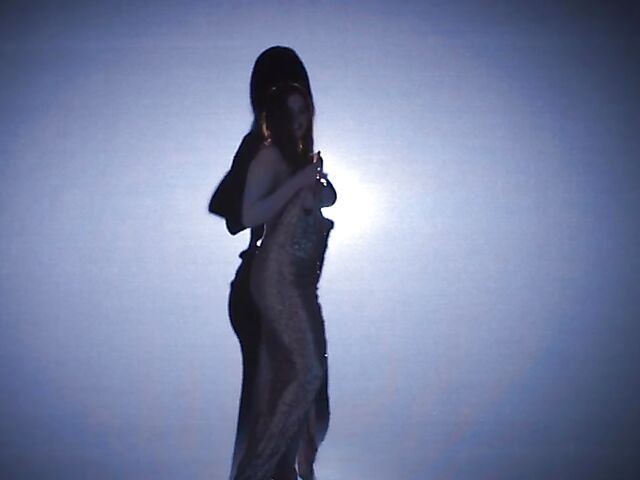 Sexy redhead Maitland Ward does a strip tease on stage