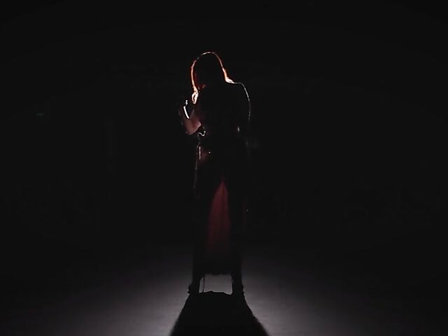 Sexy redhead Maitland Ward does a strip tease on stage