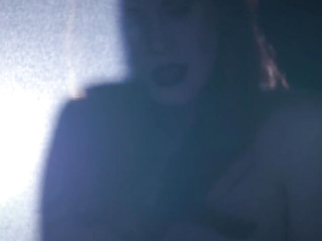 Sexy redhead Maitland Ward does a strip tease on stage