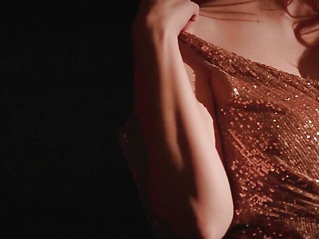 Sexy redhead Maitland Ward does a strip tease on stage