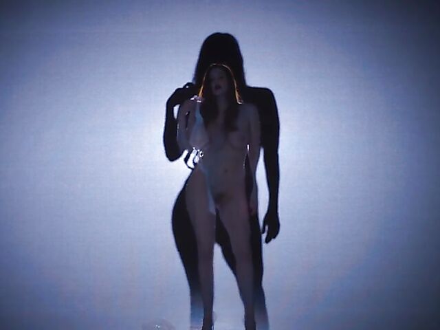 Sexy redhead Maitland Ward does a strip tease on stage