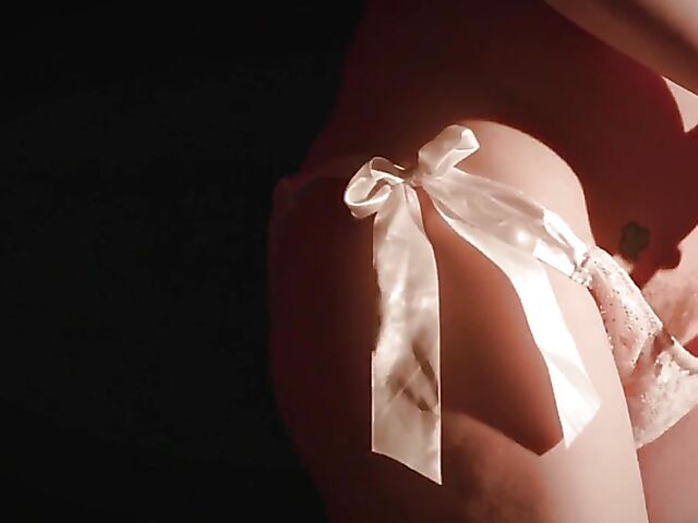 Sexy redhead Maitland Ward does a strip tease on stage