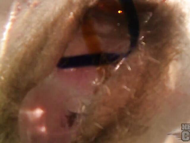 Underwater masturbation with a dildo in the hot tub with inked redhead Brille