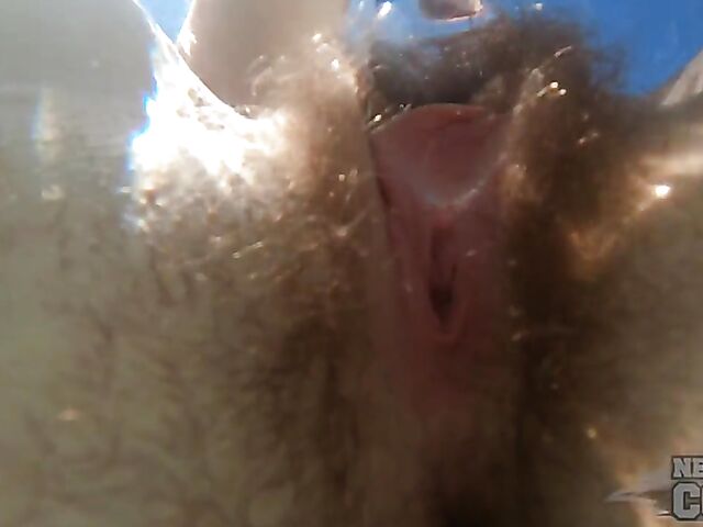 Underwater masturbation with a dildo in the hot tub with inked redhead Brille