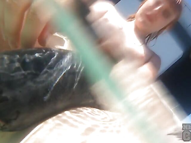 Underwater masturbation with a dildo in the hot tub with inked redhead Brille