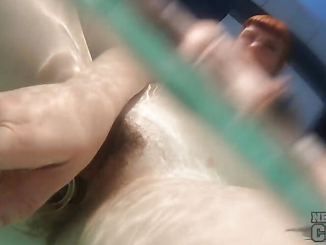 Underwater masturbation with a dildo in the hot tub with inked redhead Brille