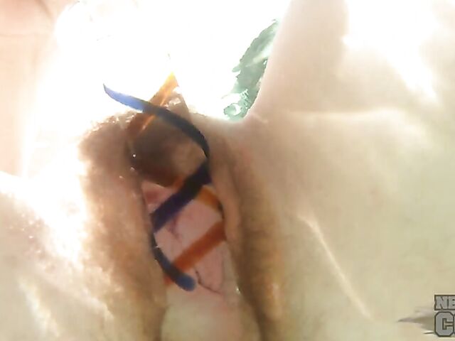 Underwater masturbation with a dildo in the hot tub with inked redhead Brille