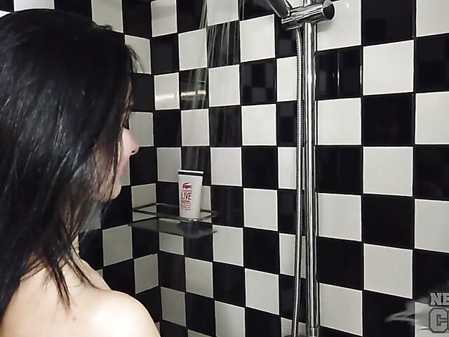 Sexy bathroom solo with pierced brunette Natasha