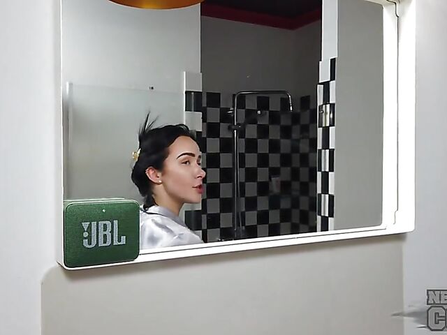 Sexy bathroom solo with pierced brunette Natasha