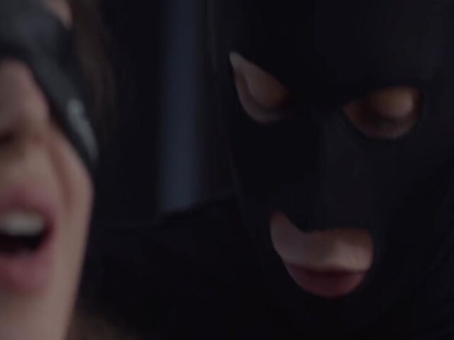 Blindfolded Sybil having passionate sex with a masked robber
