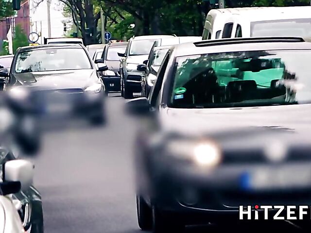 German tattooed MILF Julia Exclusiv gets her fake boobs fucked