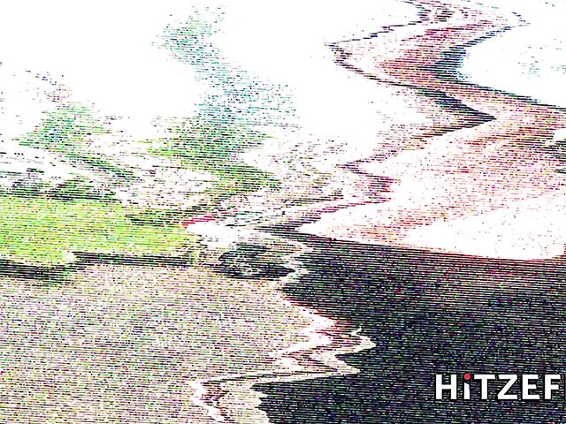 German tattooed MILF Julia Exclusiv gets her fake boobs fucked