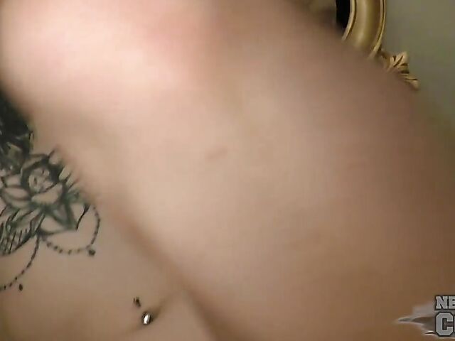 Tattooed goth girl Andy having her first fisting experience with a special dildo