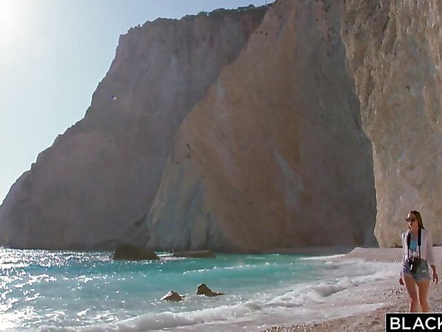 Interracial beach sex with sexy photographer Mary Popiense