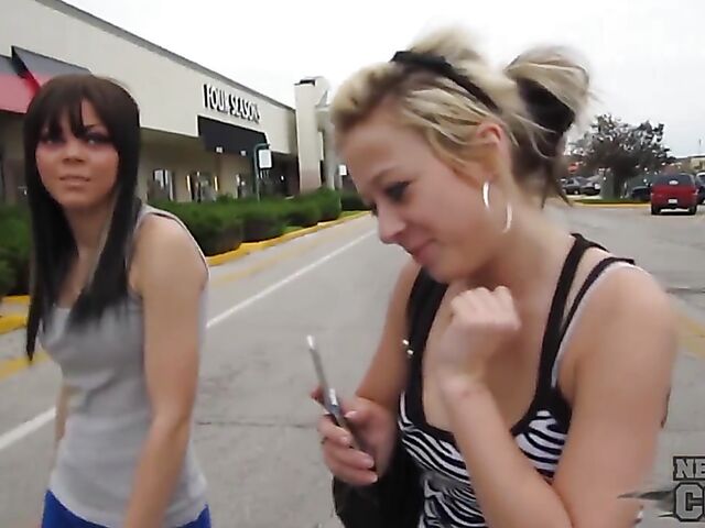 Naughty amateurs Charil and Trinity flashing tits in public