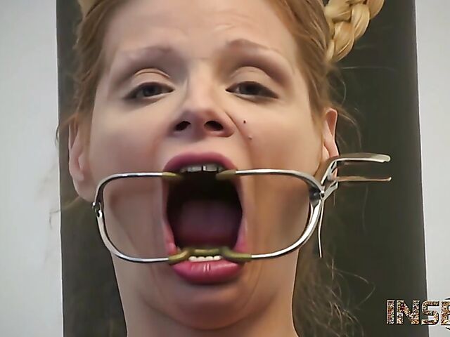 Rubber bondage and more BDSM fun with a busty slave