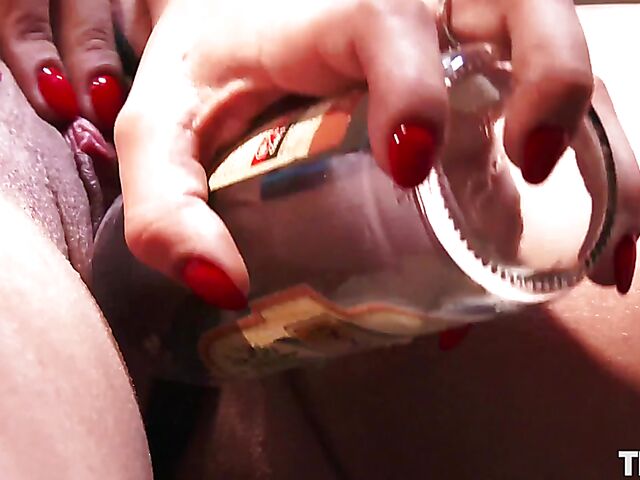 Beer lover Dolly Diore's solo bottle fuck in the bathroom of a nightclub