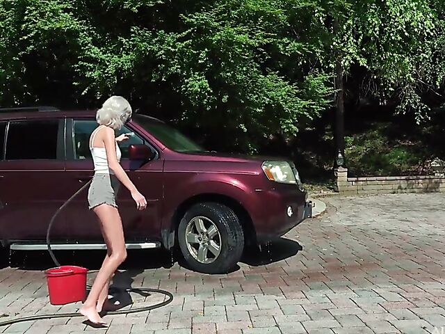 Skinny blonde Tallie Lorain spreading pussy outdoors during the car wash