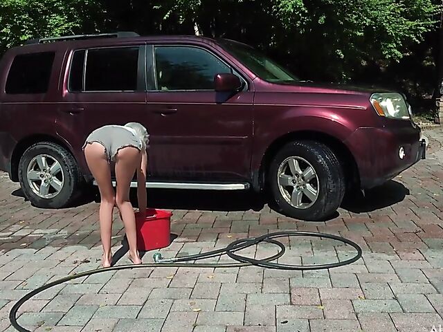 Skinny blonde Tallie Lorain spreading pussy outdoors during the car wash