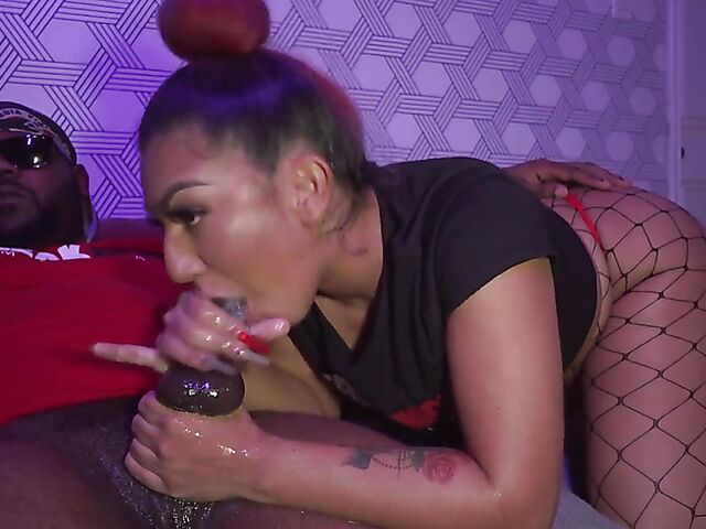 Slut in fishnets sucking black cock like there's no tomorrow