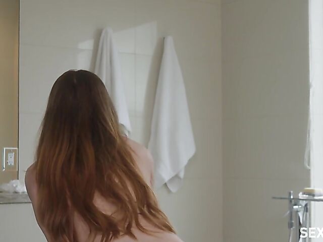 Erotic bathroom masturbation with a vibrator featuring Jillian Janson