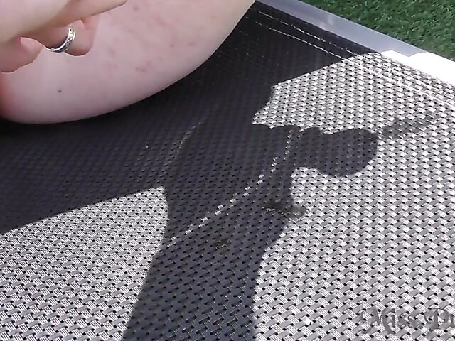 Blonde with glasses Mia shows off her nude body in the hot tub and takes her glass dildo