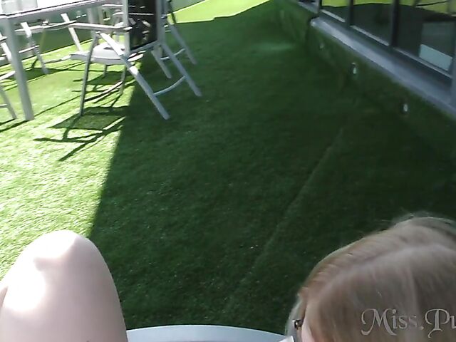 Blonde with glasses Mia shows off her nude body in the hot tub and takes her glass dildo