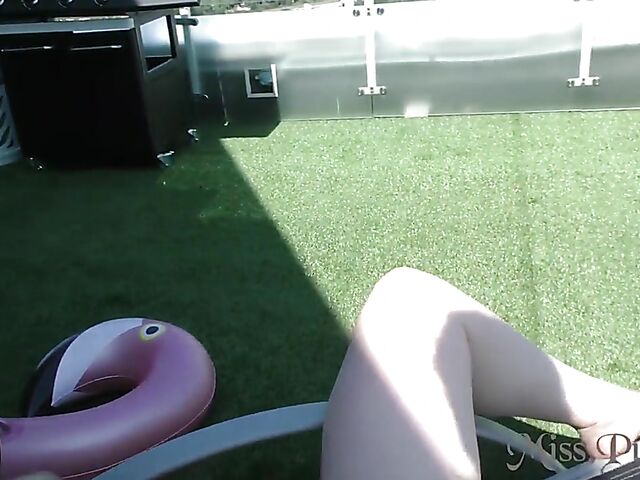 Blonde with glasses Mia shows off her nude body in the hot tub and takes her glass dildo