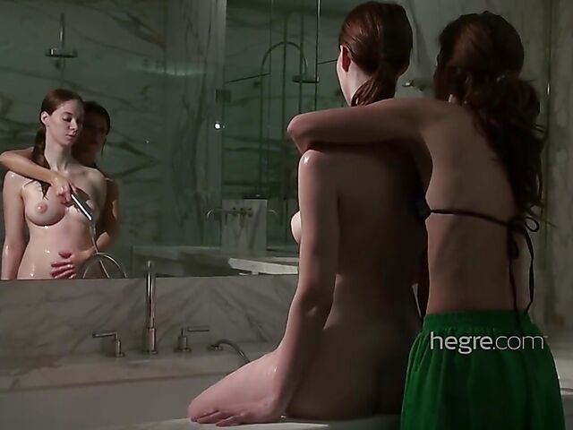 Erotic lesbian bathroom pleasure with sensual Fenna