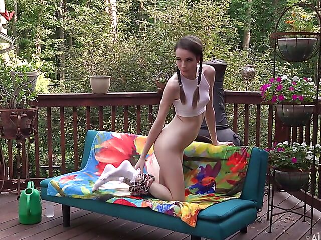 Shaved pussy insertion during Brooke Johnson's solo shoot outdoors