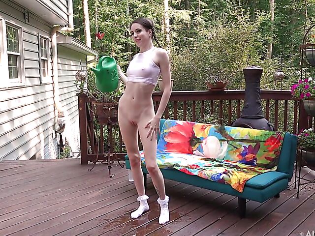 Shaved pussy insertion during Brooke Johnson's solo shoot outdoors