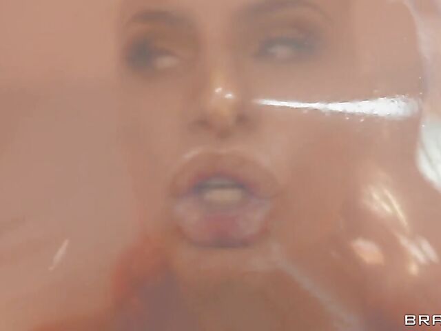 MILF Phoenix Marie anal fucked through a latex sheet